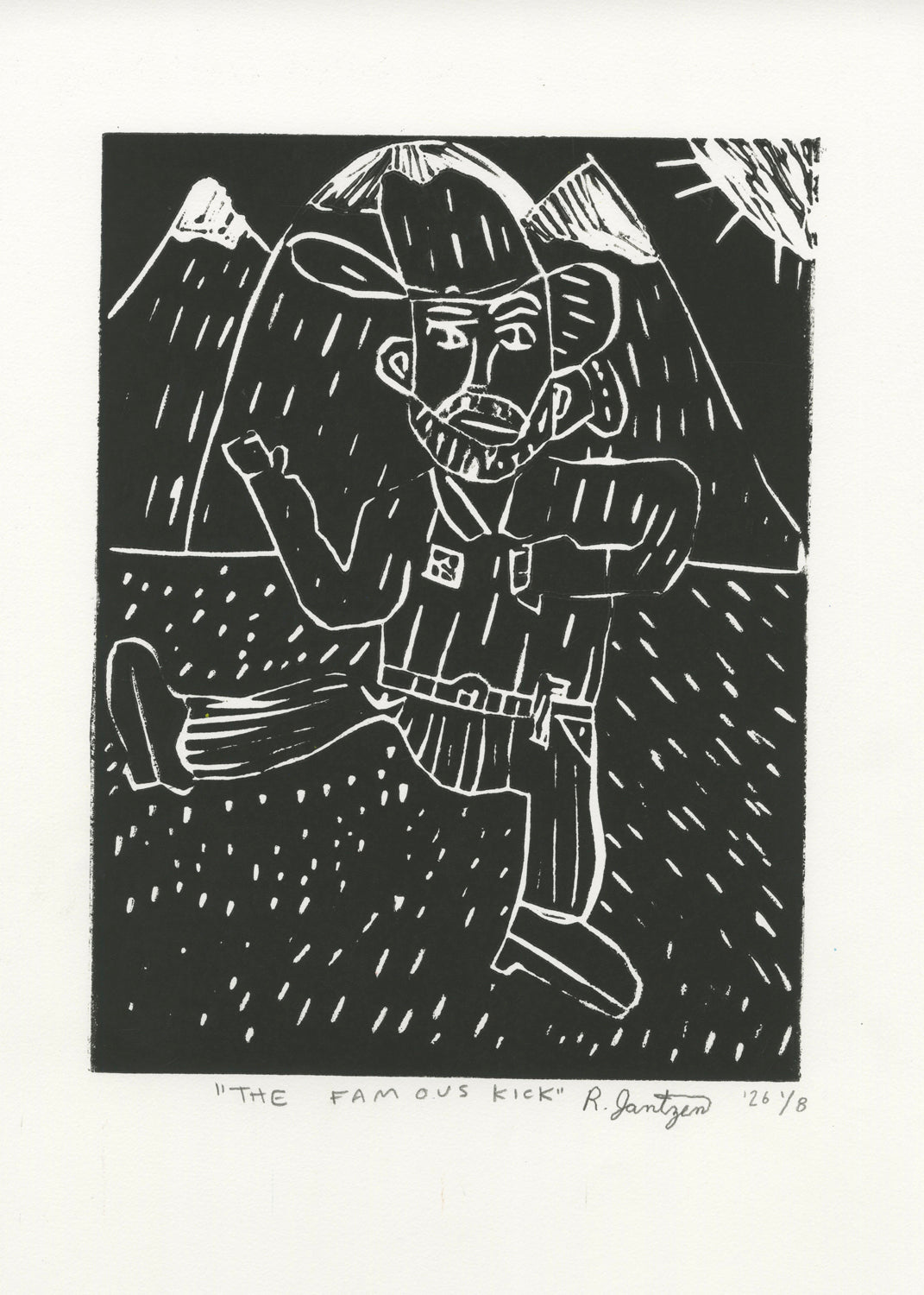 This is a linocut print on paper with black ink. The image printed depicts a figure kicking out one leg. The figure is wearing a western outfit, including a cowboy hat, a button down and a belt. In the background is a mountain scene, with the sun in the top right corner.