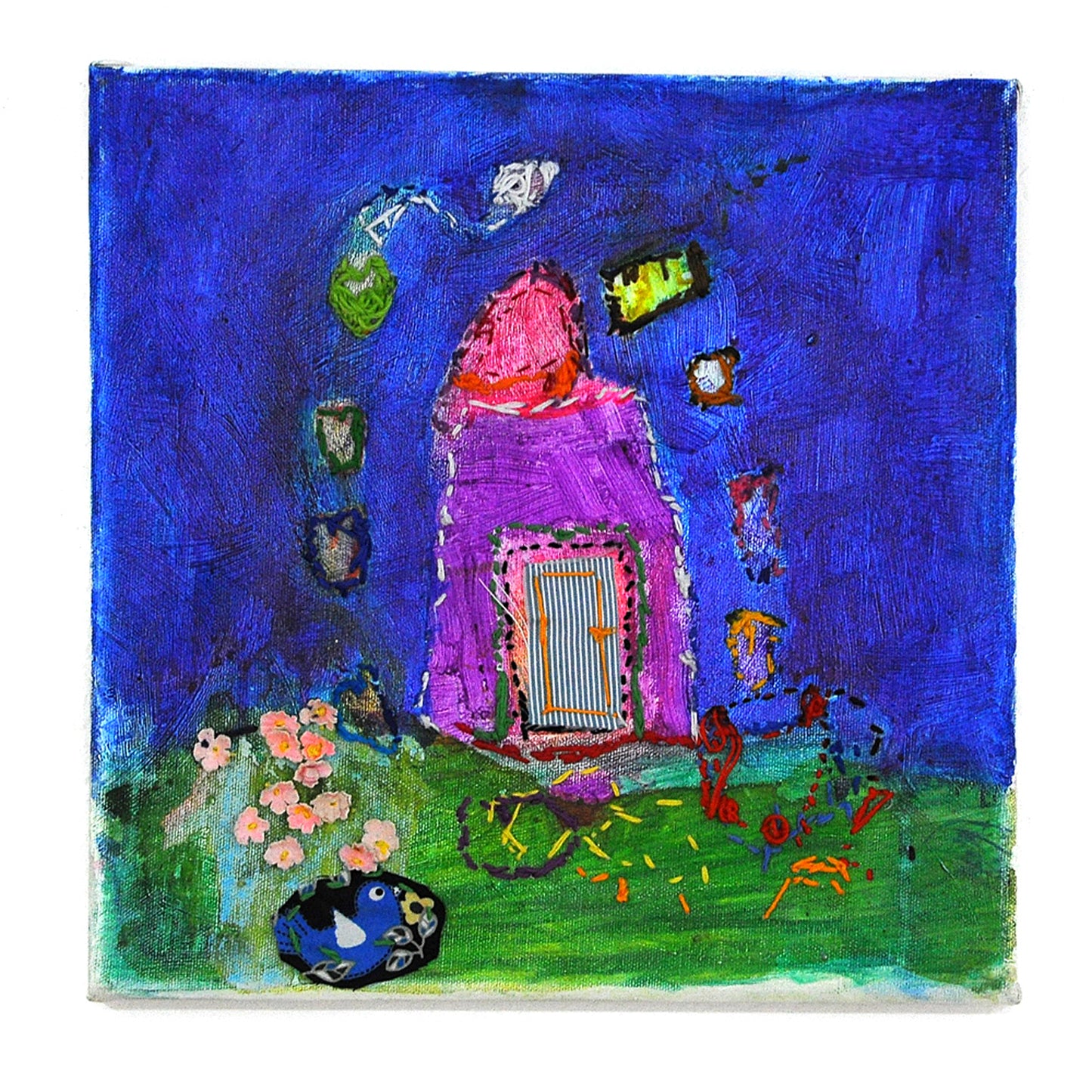 A vibrant and unique mixed media landscape with embroidered elements. There is a blue sky and green foreground with a purple house in the middle, with a floating archway of fabric around it.