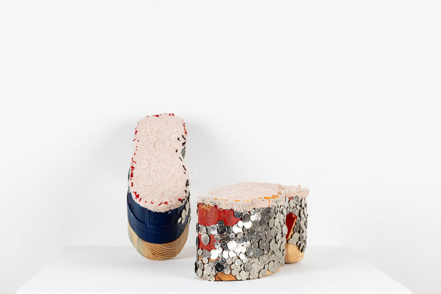 The same mixed media shoe sculpture photographed in profile from another angle.