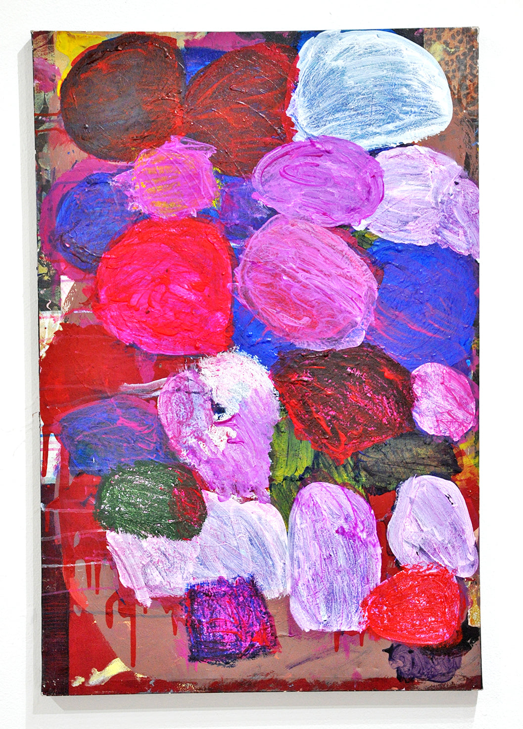 An abstract, vertically oriented painting. There are a number of round, oblong shapes that overlap in vibrant colors including pink, red, blue, and white. In the background there are different colors and textures: leopard print peeks through at the top right corner, and red paint drips towards the bottom left corner.