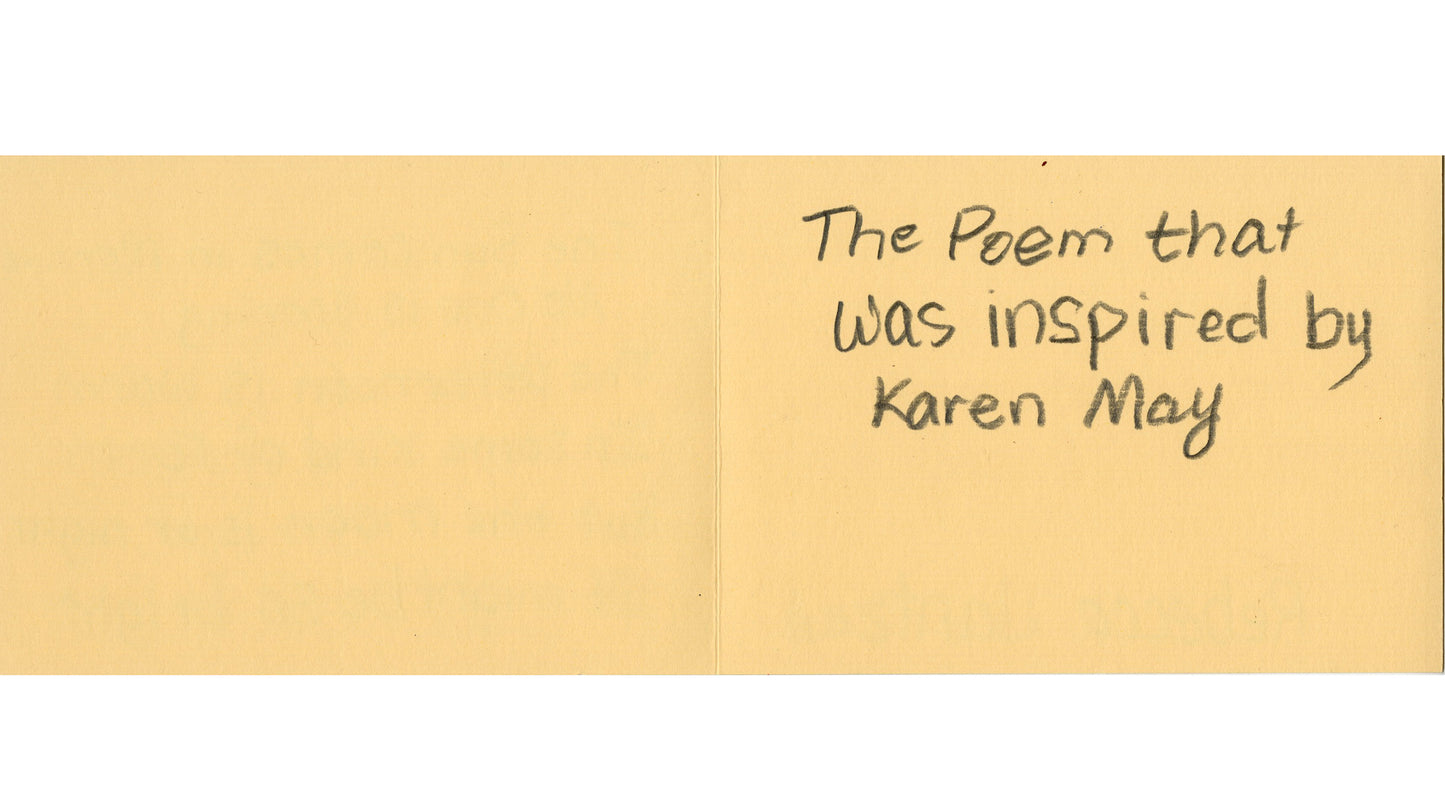 A beige piece of paper with the words "The Poem that was inspired by Karen May" hand written in a neat pencil script.