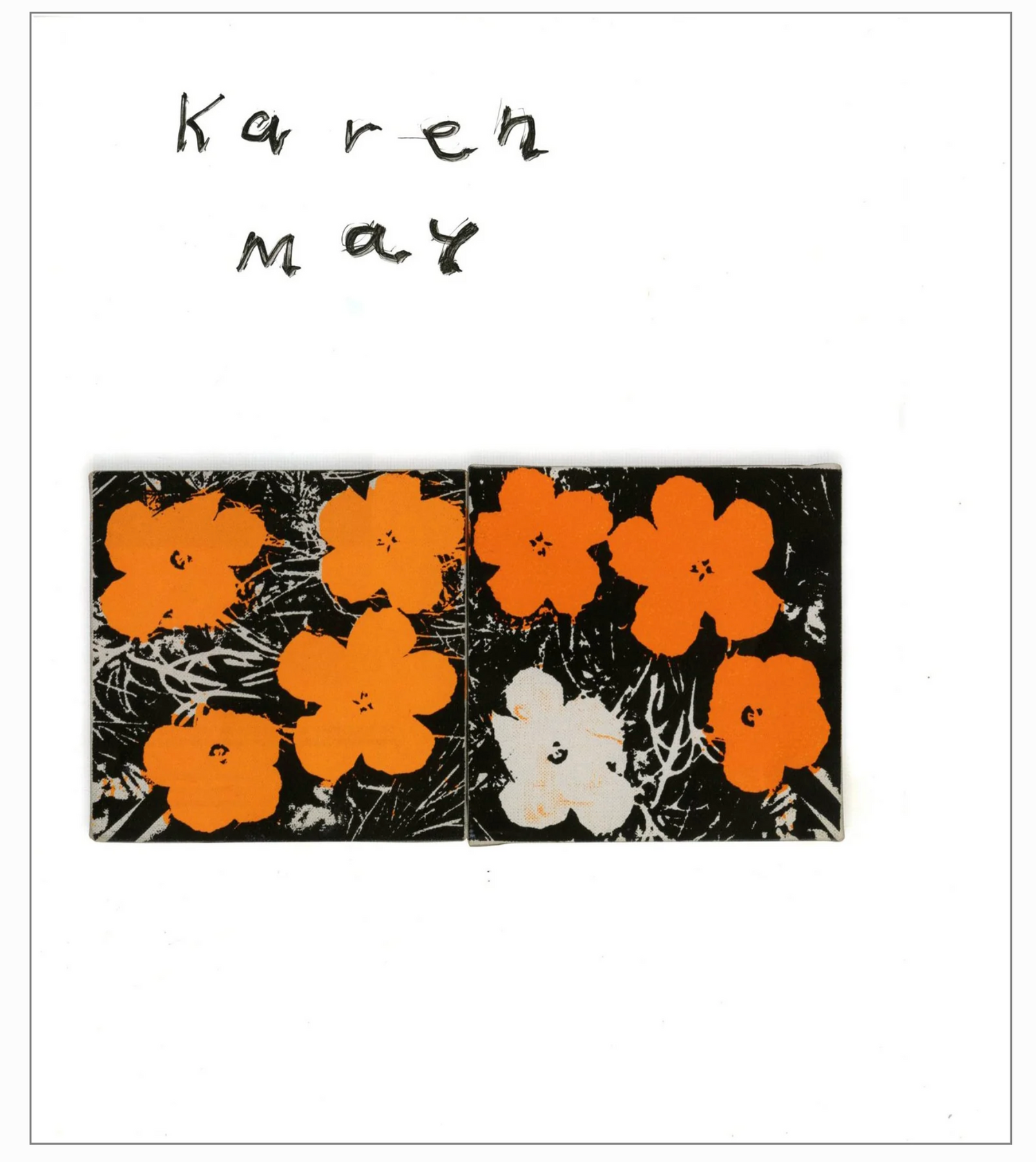 A white page from a magazine, with a black and white photo of flowers and grass. The flowers have been colored orange. The name "Karen May" is written in black marker on the top of the page.