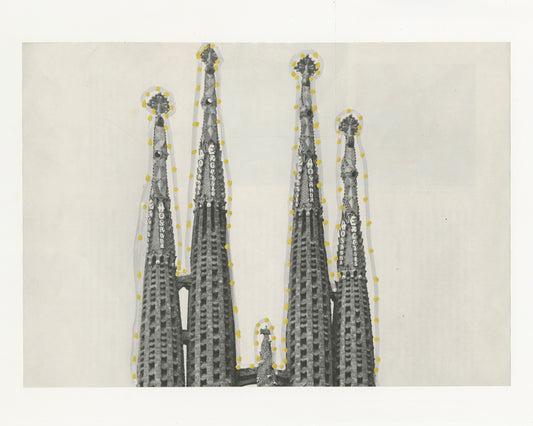 This mixed media piece contains an image of La Sagrada Familia There is a grey outline of the Bascilica alongside gold dots.
