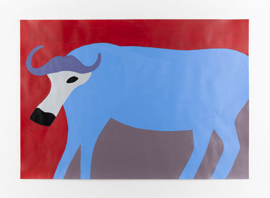 A stylized, abstract depiction of a buffalo. The body of the buffalo is painted in a flat, vibrant blue, contrasting against a deep red background. It is depicted shown in profile view, with a distinctively curved, purple horn and a black snout. The animal's neck and part of its face are colored in off-white, while the eye is a bold black oval. The legs and underbelly share a muted grayish-purple tone, adding to the abstraction. The composition is simple, with clean lines and solid patches of color.