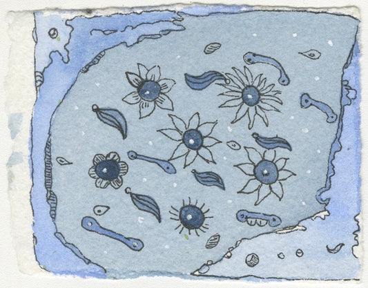 Bird's eye view of a watercolor drawing on paper depicting a blue island. Flowers and abstract shapes populate the island. 