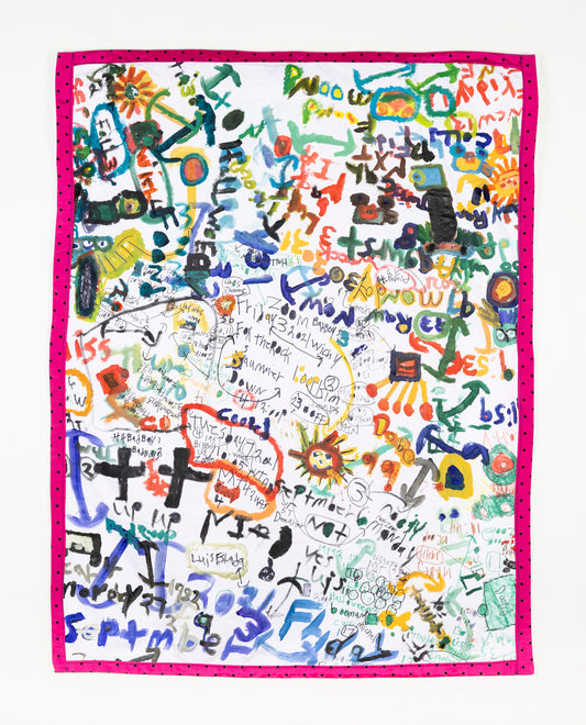 This fiber piece has a collage-like quality, with the combination of text and icons overlapping one another to form the composition of the piece. The text and icons are multi-colored; black, green, red, blue and yellow that contrast the white background. The piece is bordered with a pink and black polka dot fabric. 