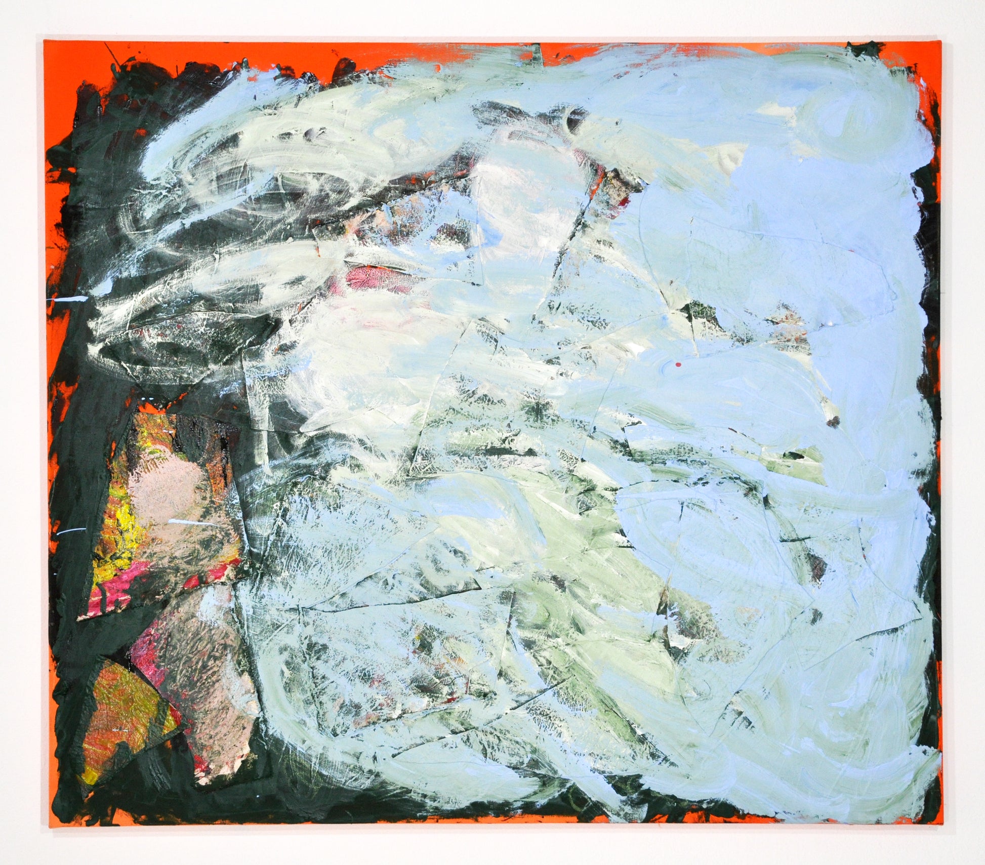 An abstract painting on a large square canvas. Around the edges, the bright orange ground peeks out behind layers of thick black and a huge cloud of mottled pale blue paint. 