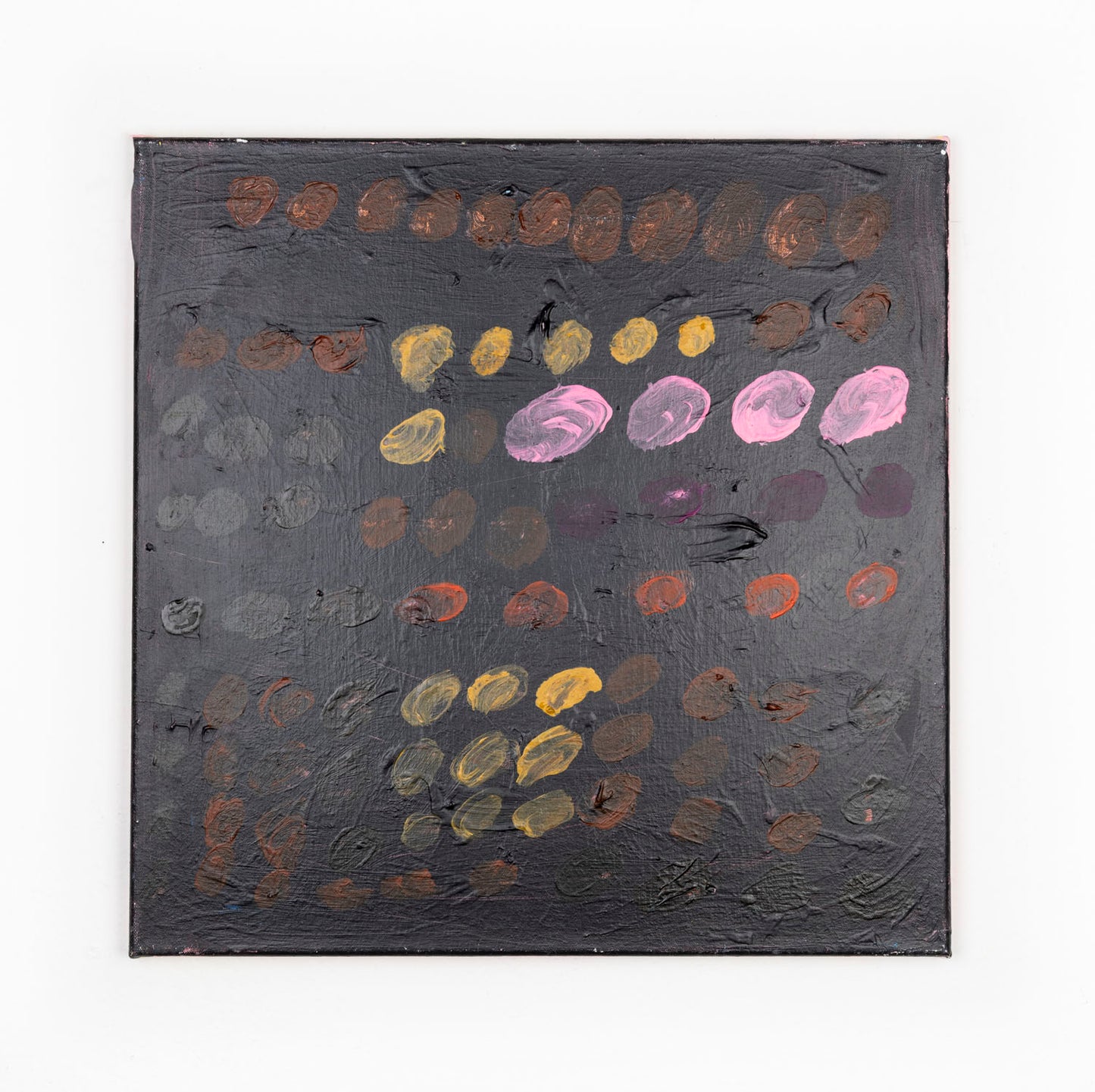 Rows and rows of multi-colored dots fill the canvas. The dots are shades of brown, orange, pink, purple and yellow; varying in size and opacity against a black background. 