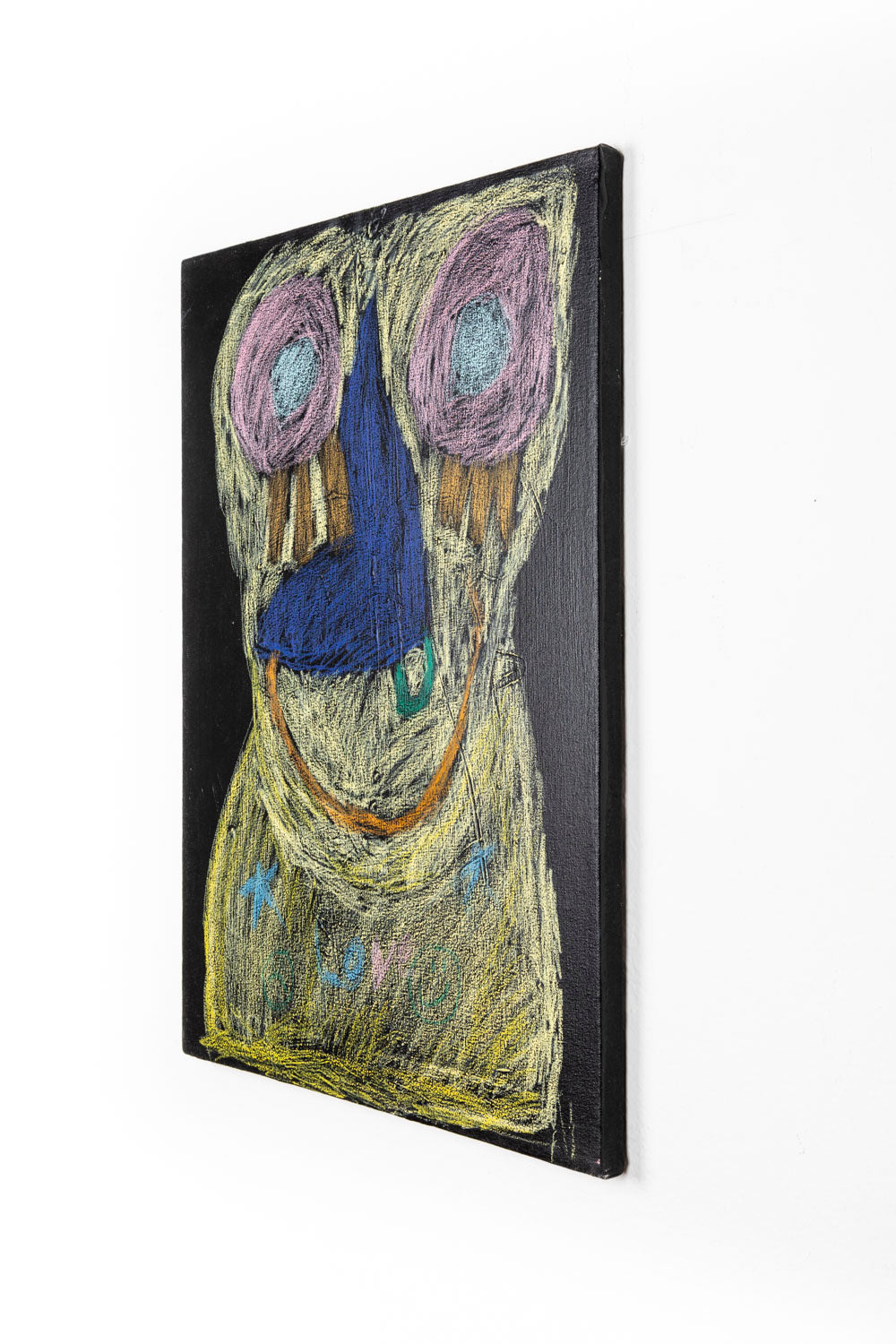 This is an abstract portrait, with pink eyes, a blue nose and an orange mouth. The figure is  bright yellow which contrasts the black background.