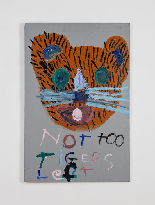 A painting on canvas photographed against a white wall. The image features a large flat and stylized tiger head floating above hand painted text. The tiger face is orange  with rounded ears,  big green eyes, blue whiskers, and a pink smiling mouth. The face is covered in short black dash marks. Beneath the head, the artist painted letters in pink blue or green to form the words "Not Too Tigers Left" . The background of the painting is  warm grey.