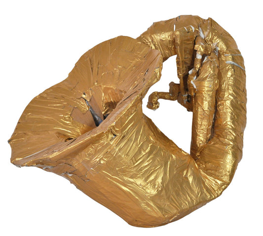 A tuba featuring a mouthpiece and large bell. The sculpture is wrapped in gold tape and has bits of cardboard peeking out from beneath it. 