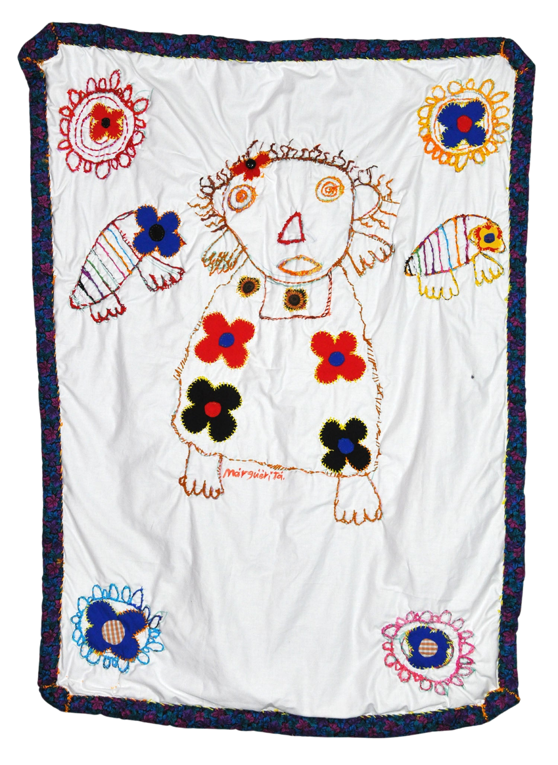 a white wall-hanging quilt with colorful figures embroidered on it. the central figure is a person with a flower dress. there are also two birds on either side of the person, and 4 large flowers embroidered in each corner