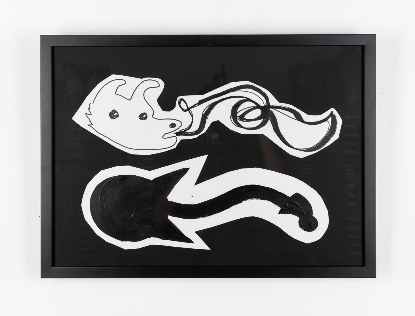 This drawing depicts two creatures that are horizontally stacked. The creature on top is drawn with thin black ink, its facial features are outlined against the white paper. The creature on the bottom is fully colored in black ink, only highlighting its silhouette against the white paper. Both creatures are cut out and layered on top of a black background. 
