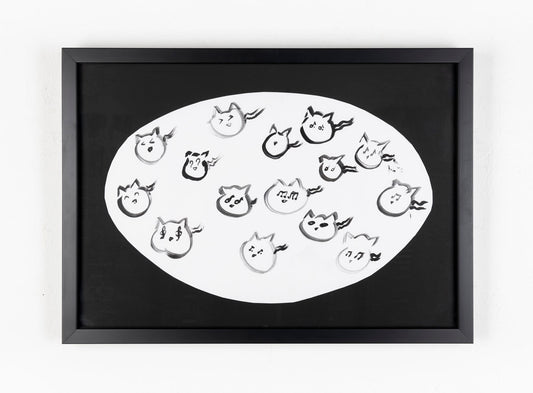 This black ink drawing consists of 15 cat heads in the center of the piece. The cats are contained in a white oval which contrasts the black background.