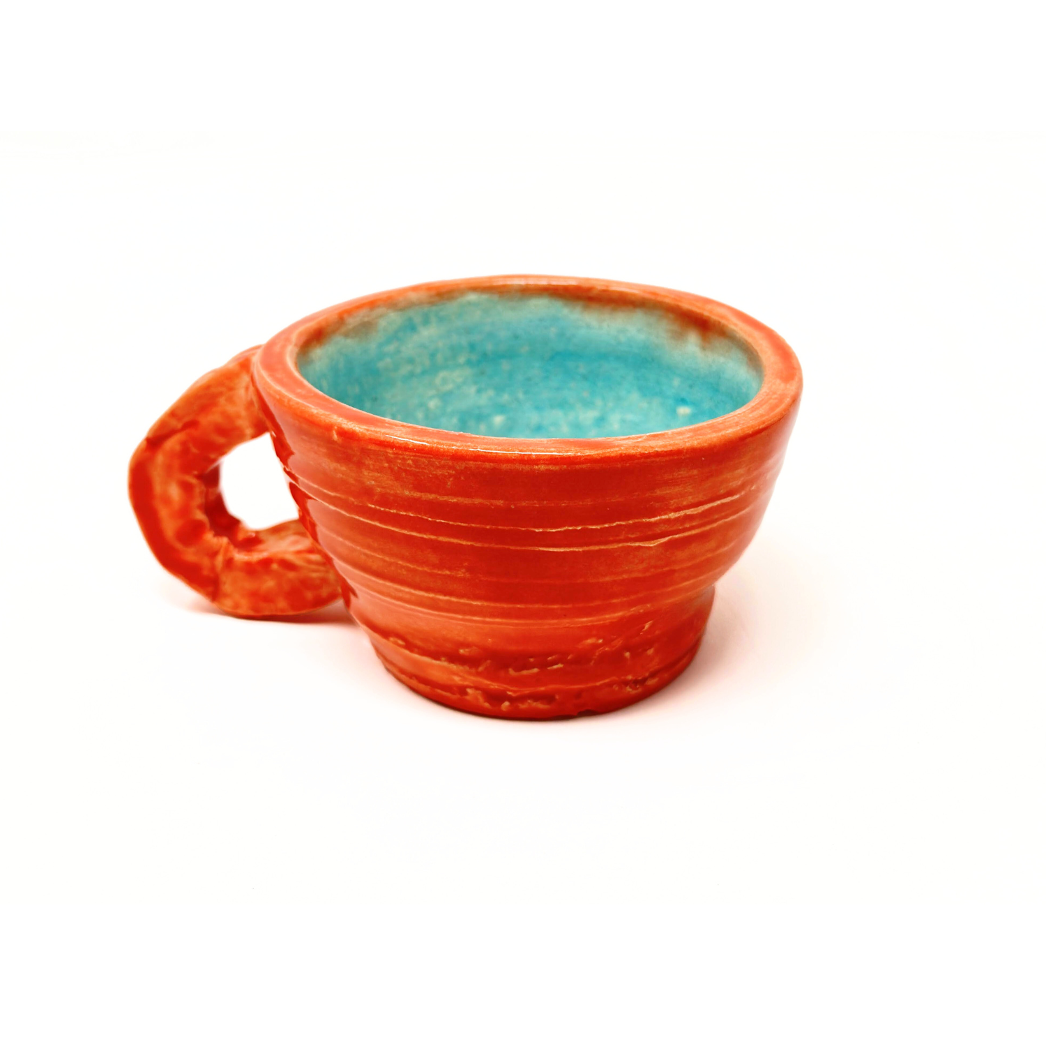 The same ceramic mug photographed from a slightly lower angle. 