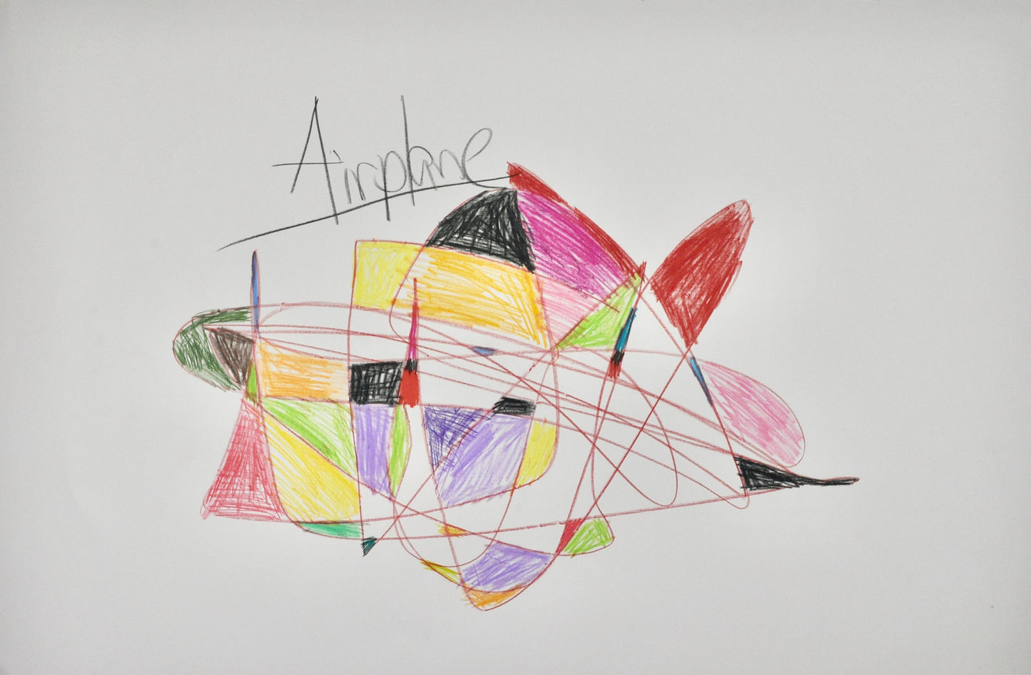 An abstract colorful form drawn on white paper. In the center of the page is a starburst line drawing with sections colored red, purple, black or yellow. Above this form, the word "Airplane" is written in black pencil.