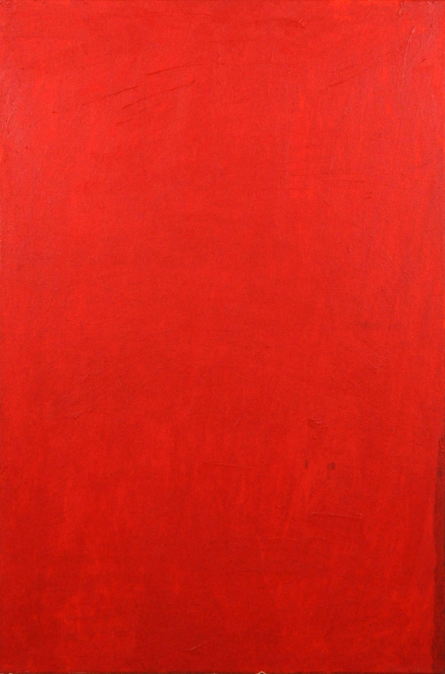 a monochromatic painting on a tall rectangular canvas. the entire surface is covered in a smooth layer of striking bright red paint.