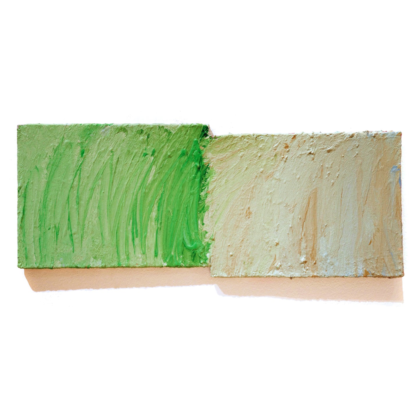 Two small rectangular canvases bonded together side by side with thick impasto paint. The canvas on the left is painted bright green in energetic vertical brushstrokes. The painting on the right sits slightly lower, and is coated with pale brown and white paint. 