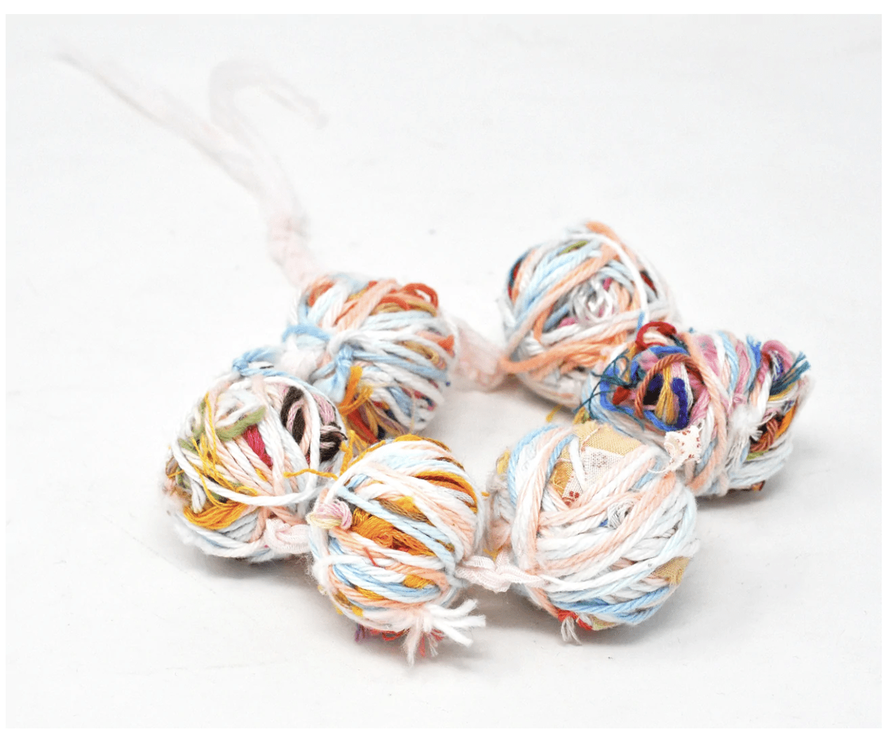 colorful yarn ball bracelet
