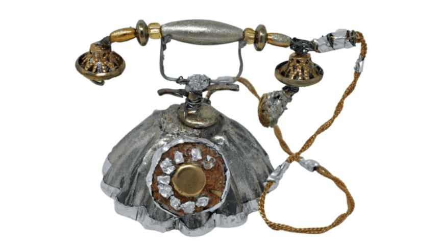 mixed media french telephone sculpture. materials include aluminum foil, chains, and duct tape.